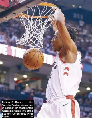  ?? AFP ?? DeMar DeRozan of the Toronto Raptors slams one in against the Washington Wizards in Game Two of the Eastern Conference First Round.