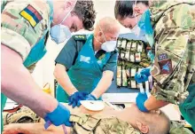  ??  ?? Military medics from 16 Medical Regiment undergo training at Colchester’s Merville Barracks, Essex, to work on ambulances in partnershi­p with NHS paramedics.