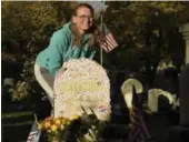  ?? ADAM FENSTER/REUTERS ?? Brenda Klein was among those who made a pilgrimage on Tuesday to the grave of women’s suffrage leader Susan B. Anthony in Rochester, N.Y.