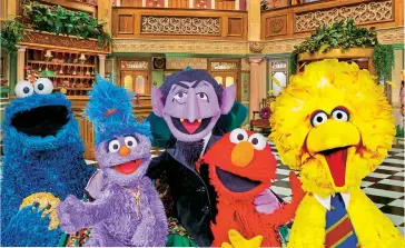  ??  ?? Cookie Monster, Phoebe, Count von Count, Elmo and Big Bird and (below) Funella and Furgus