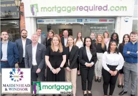  ?? ?? Staff members outside the Mortgage Required office in Maidenhead. The company is sponsoring the Young Hero award. Ref:134773-6