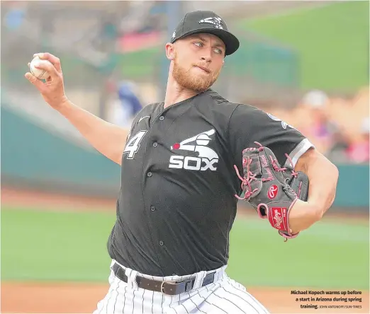  ?? JOHN ANTONOFF/SUN-TIMES ?? Michael Kopech warms up before a start in Arizona during spring training.