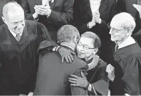  ??  ?? President Barack Obama greets Supreme Court Justice Ruth Bader Ginsburg before the State of the Union address Jan. 25, 2011. CHIP SOMODEVILL­A/GETTY IMAGES