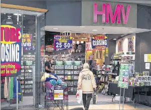  ?? CP PHOTO ?? An HMV outlet is seen at the Mic Mac Mall in Dartmouth, N.S. on Friday, Feb. 24, 2017. Adrian Doran knows he’s clinging onto what many consider an obsolete music format, but for him there’s still plenty to love about compact discs.