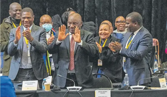  ?? Picture: AP Photo/Jerome Delay ?? South African président Cyril Ramaphosa reacts after being reelected as leader of the country in Cape Town, South Africa, Friday.