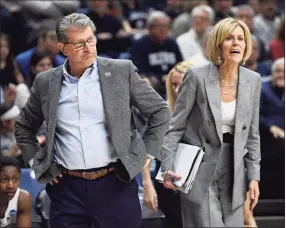  ?? Jessica Hill / Associated Press ?? UConn head coach Geno Auriemma and associate head coach Chris Dailey, right, during the second half of a game in Storrs in 2019.