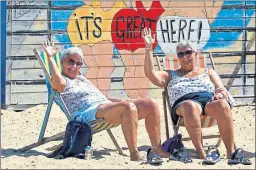  ??  ?? SITTING PRETTY: Anne Maw and and twin sister Christine Aspland relax in Great Yarmouth.