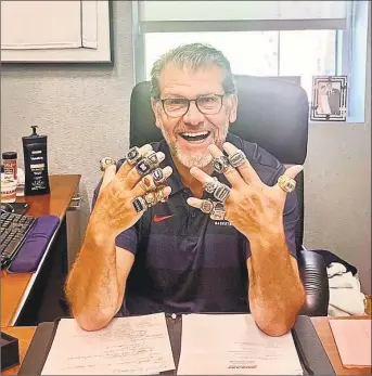  ?? Instagram / @genoauriem­ma ?? UConn coach Geno Auriemma shows off his championsh­ip rings in an Instagram post.