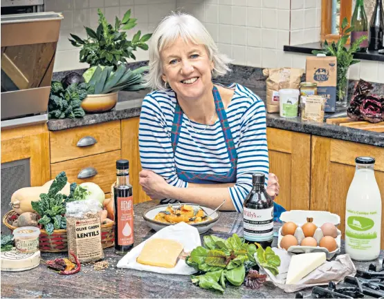  ??  ?? Clare Hargreaves stocks up on British ingredient­s to fulfil her pledge for 2021, including hemp oil to make her squash risotto, below