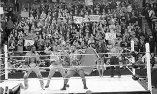  ?? SARAH ESPEDIDO/ORLANDO SENTINEL ?? WWE has brought thousands of fans to Amway Center, including this sellout crowd watching the New Day at the 2016 Royal Rumble. The company is making plans to bring SummerSlam to the arena Aug. 23, though without fans, a city spokeswoma­n said.