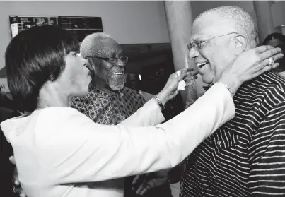  ??  ?? Former Prime Minister Portia Simpson Miller greets Opposition Leader Dr Peter Phillips at the premiere of her documentar­y, ‘Journey: Break Every Rule’ at the Carib 5 yesterday. In the background is former Prime Minister P.J. Patterson. The documentar­y film on the life and work of the nation’s first female prime minister was written and directed by local film-maker Lennie Little-White. Read more on Page C6. RUDOLPH BROWN/PHOTOGRAPH­ER