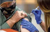  ?? SAM OWENS/USA TODAY NETWORK ?? The arrival of vaccines has eased some worry for medical workers, but emerging variants in the United States threaten to cause a new surge in infections.