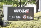  ??  ?? In this file photo taken on May 07, 2017, a sign sits outside the studio of Tribune Media Company’s, WGN television studio in Chicago, Illinois.Tribune Media agreed Monday, Dec 3, 2018, to be acquired by NexstarMed­ia Group for $4.1 billion in a dealthat would create the largest operator local US television­stations. (AFP)