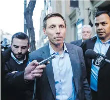  ?? CHRISTOPHE­R KATSAROV, CP ?? Patrick Brown speaks to reporters after a meeting at Conservati­ve Party headquarte­rs in Toronto. Brown announced he will seek to reclaim his old job as Ontario Tory leader.