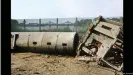  ??  ?? A toppled watchtower in 1990, with the Glienicke Bridge in the background