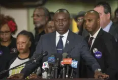  ?? HECTOR AMEZCUA/THE SACRAMENTO BEE VIA AP ?? Clark family attorney Benjamin Crump appears with community members before findings from the private autopsy of Stephon Clark were presented during a news conference at Sacramento Christian Center on Friday in Sacramento.