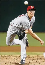  ?? RALPH FRESO / AP ?? Homer Bailey, attempting to return from arthroscop­ic surgery on his right elbow, is on track to be back by midto late June if all goes according to plan.