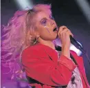  ?? Seth McConnell, Special to The Denver Post ?? Hayley Williams of Paramore performs at Red Rocks in 2018. Her solo tour is stopping in Denver.