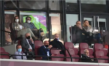  ??  ?? West Ham’s co-owners, David Sullivan (top right) and David Gold (centre), watch their club’s defeat against Newcastle. Photograph: Michael Regan/Getty Images