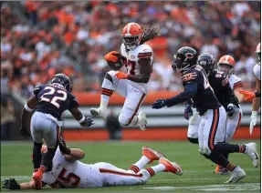  ?? TIM PHILLIS — FOR THE NEWS-HERALD ?? Running back Kareem Hunt carries during the Browns’ win over the Bears on Sept. 26.