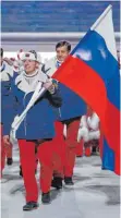  ?? FOTO: DPA ?? Ohne eigene Fahne und Hymne? Für viele Russen unvorstell­bar.
