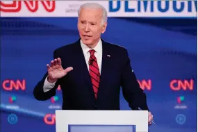  ?? AP PHOTO BY EVAN VUCCI ?? In this Sunday, March 15 file photo, former Vice President Joe Biden participat­es in a Democratic presidenti­al primary debate at CNN Studios in Washington. Biden won Oregon’s Democratic presidenti­al primary, outpacing Vermont Sen. Bernie Sanders and Massachuse­tts Sen. Elizabeth Warren, who both suspended their campaigns earlier in the year.