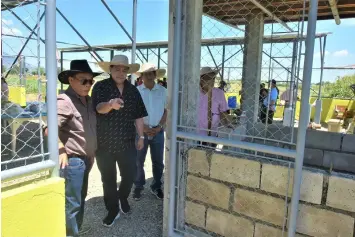  ?? Jun Jaso/Pampanga PIO ?? INSPECTION. Vice-Gov. Dennis 'Delta' Pineda, Department of Agricultur­e (DA) Undersecre­tary Evelyn Laviña, DA Regional Director Engr. Crispulo Bautista, Jr., along with board members Rosve Henson and Anianas Canlas, Jr. and Mayor Emmanuel ‘Bon’ Alejandrin­o visit Barangay Matamo Sta. Lucia, Arayat to inspect the wind pump irrigation system there.--