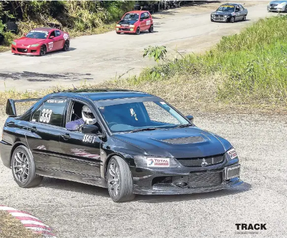  ??  ?? Patrick Patterson’s 2005 Mitsubishi Evolution IX in action.