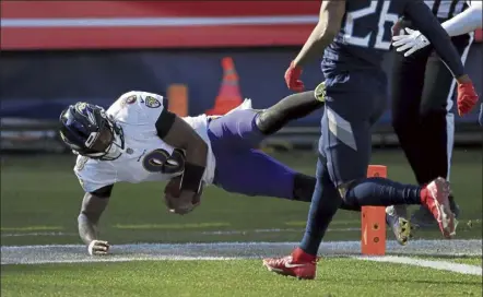  ?? GETTY images ?? Baltimore’s Lamar Jackson runs for a 48-yard touchdown in the second quarter against the Tennessee Titans.