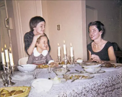  ??  ?? Mary and Cynthia Carr (now Mary Robb Jackson and Cynthia Gardner) with their mother, Dorothy Watt Carr, in 1956.