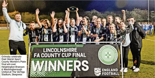  ?? ?? Grimsby celebrate their Marsh Sport County Women’s Plate final win over Heighingto­n Branson & Washingbor­ough United at The Vertigo Stadium, Skegness