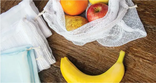  ??  ?? Reusable grocery bags were created with the best of intentions — to reduce the use of plastic bags — but they have added to the clutter problem in many homes.
