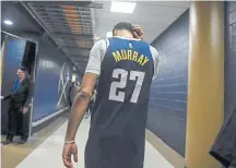  ?? AAron Ontiveroz, The Denver Post ?? Denver’s Jamal Murray scratches his head as he walks to the locker room after the fourth quarter of Golden State's 116-100 victory Tuesday night.