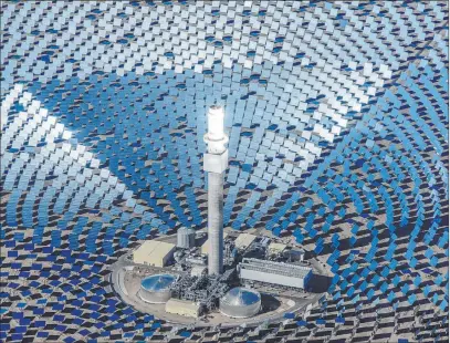  ?? Pahrump Valley Times file ?? This 2015 file photo shows an aerial view of the Crescent Dunes Solar Energy Plant in Tonopah.