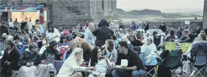  ?? Photograph: Stuart Boulton. ?? Open air film night at Bamburgh Castle.