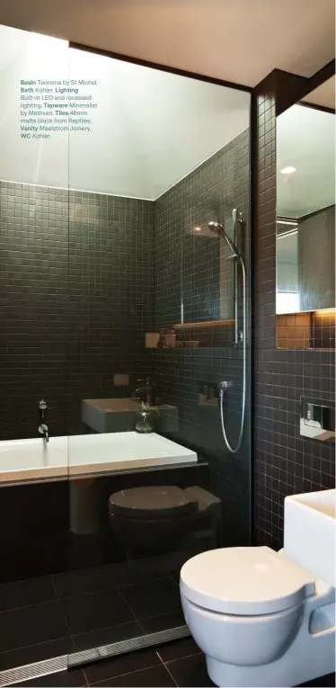  ??  ?? Basin Teorema by St Michel. Bath Kohler. Lighting Built-in LED and recessed lighting. Tapware Minimalist by Methven. Tiles 46mm matte black from Reptiles. Vanity Maelstrom Joinery. WC Kohler.