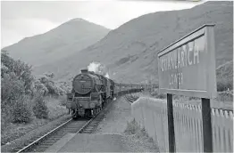  ?? ?? Double delight: Against an imposing background of 3852ft high Ben More, LMS 4-6-0 ‘Black Five’ No. 45400 of Stirling shed (65J) and an unidentifi­ed member of the same class approach Crianlaric­h Lower with a train of at least nine coaches in the early 1960s. A totem platform sign from the Scottish station sold for a record £30,000 at a GW Railwayana auction on November 12.
TRANSPORT TREASURY/NORRIS FORREST