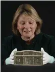  ?? ?? Dr Anna Groundwate­r pictured with the rare French silver casket