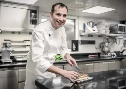  ??  ?? Pastry chef Francois Perret at the Ritz Hotel, Paris. For two weeks, Perret crisscross­ed California to discover local desserts and invited Americans to taste them. — AFP