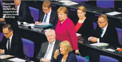  ?? PHOTOS: GETTY IMAGES ?? Chancellor Angela Merkel, who supported the motion, in the Bundestag