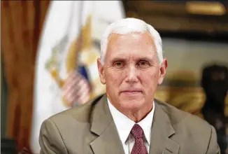  ?? ALEX BRANDON / AP ?? Vice President Mike Pence says President Donald Trump has cut through more red tape “than any president in American history,” but the amount saved by doing so has yet to be determined.