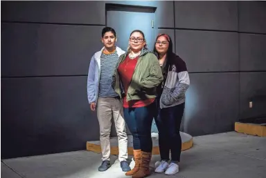  ??  ?? Priscilla Marquez, whose daughter Charisma Marquez’s remains were found recently in the girl’s foster parents’ home, stands with her children, Estevaun Lauro, 21, and Mia Cruz, 14, on Wednesday.