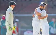  ??  ?? Australia skipper Tim Paine’s (left) sledging of R Ashwin during the third Test has embarrasse­d Cricket Australia.