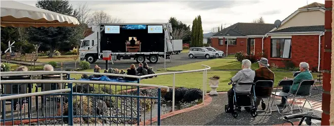  ??  ?? Residents of Stillwater Lifecare and Village in Nelson enjoy one of the free, contactles­s organ concerts by From Us With Aroha. The charity is now seeking help to complete the North Island leg of its tour.