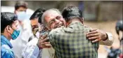  ?? PTI ?? Relatives of a COVID-19 victim mourn outside the mortuary of a COVID-19 hospital in Ahmedabad, on Thursday