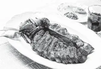  ?? Photos by Julie Soefer ?? Rosalie Italian Soul’s menu features Bistecca Fiorentina (44 Farms steak served with potatoes, fennel, pickled peppers and red and green sauces).