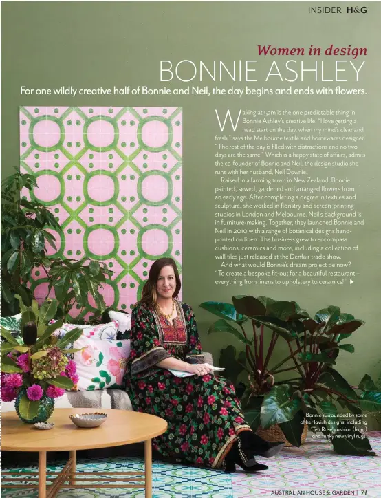  ??  ?? Bonnie surrounded by some of her lavish designs, including a ‘Tea Rose’ cushion (front) and funky new vinyl rugs.