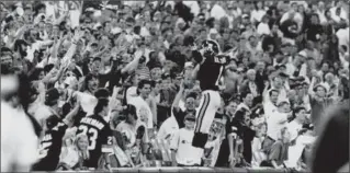  ?? RON BULL, TORONTO STAR ?? Darrell K. Smith exhorts the crowd at a 1992 Argos game at the SkyDome in Toronto.