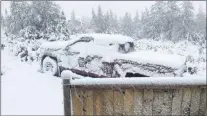  ?? SUBMITTED ?? Snow covers a pickup truck near Burgeo, N.L., on Tuesday, June 26, 2018, in this handout photo.