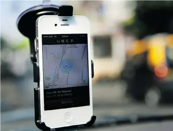  ?? RAFIQ MAQBOOL/THE ASSOCIATED PRESS ?? Uber has been running radio ads in B.C. in a bid to have the province approve its ride-sharing service.